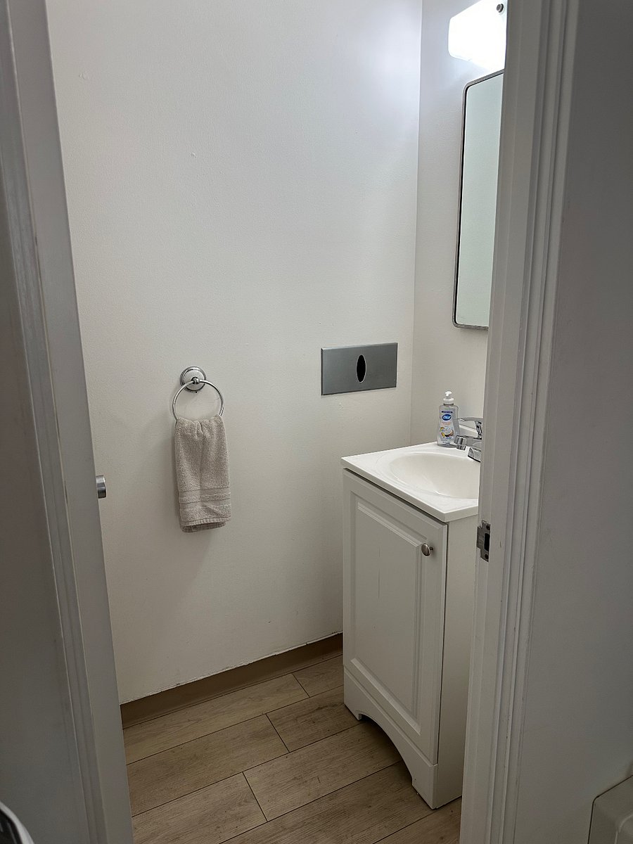 half bath off of laundry room which is off of family room