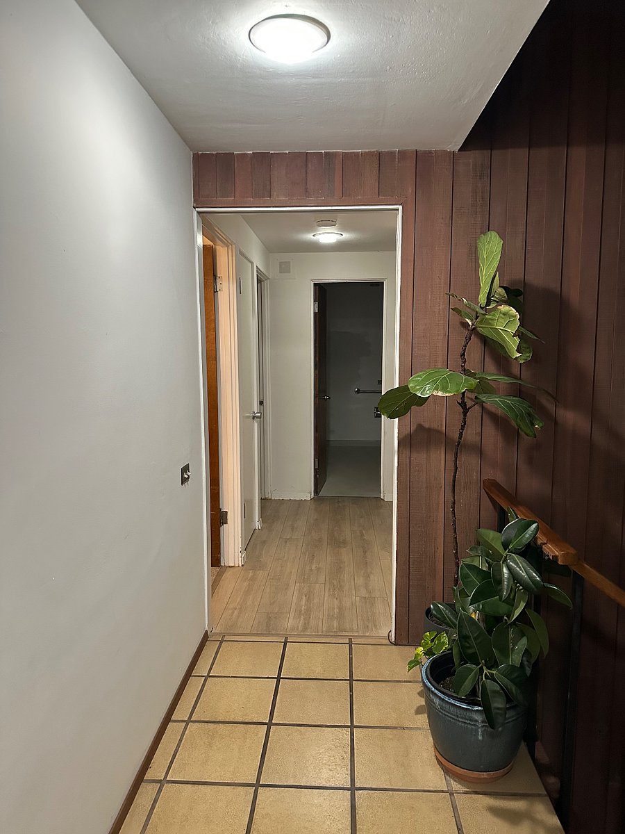 hallway to bedrooms - full bath with shower and separate tub at end of hallway