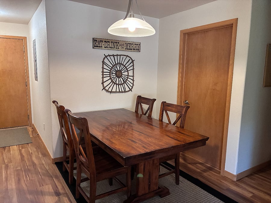 Dining room table. Additional bench seating not shown.