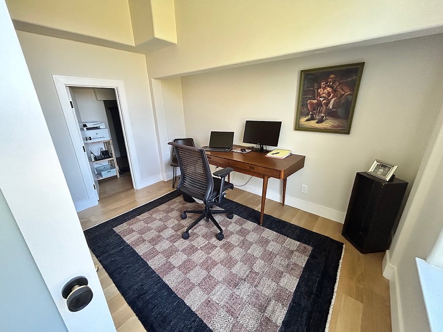 Dedicated office space with a view of backyard