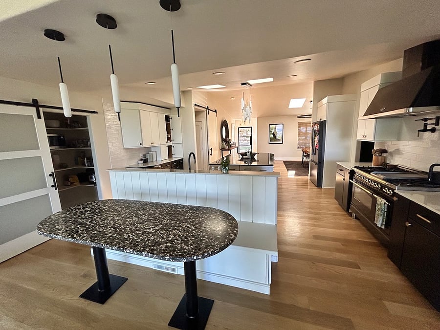 Dinette with concrete collaborative dinning table.