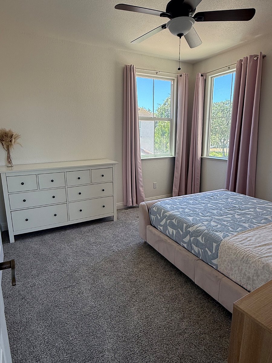 Bedroom #3 with full size bed. Shared bathroom. $1000/month.