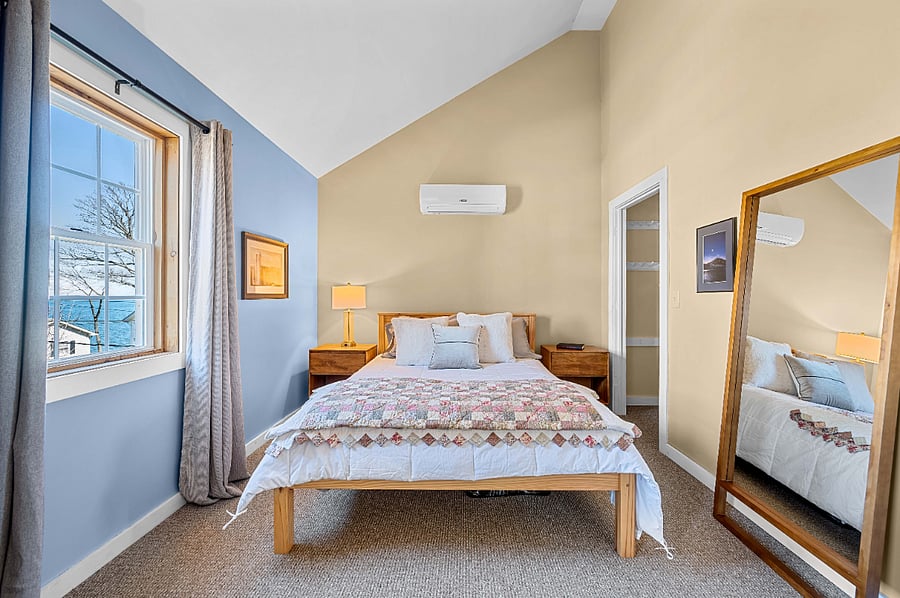 Bedroom 1 has lake views and Queen bed plus its own A/C and heat