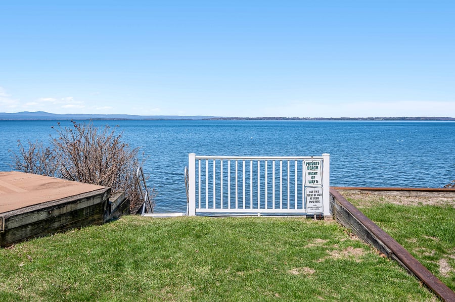Direct lake access to private beach
