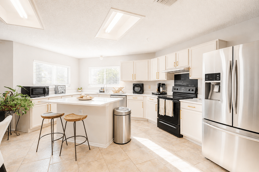 Kitchen island with bar stools