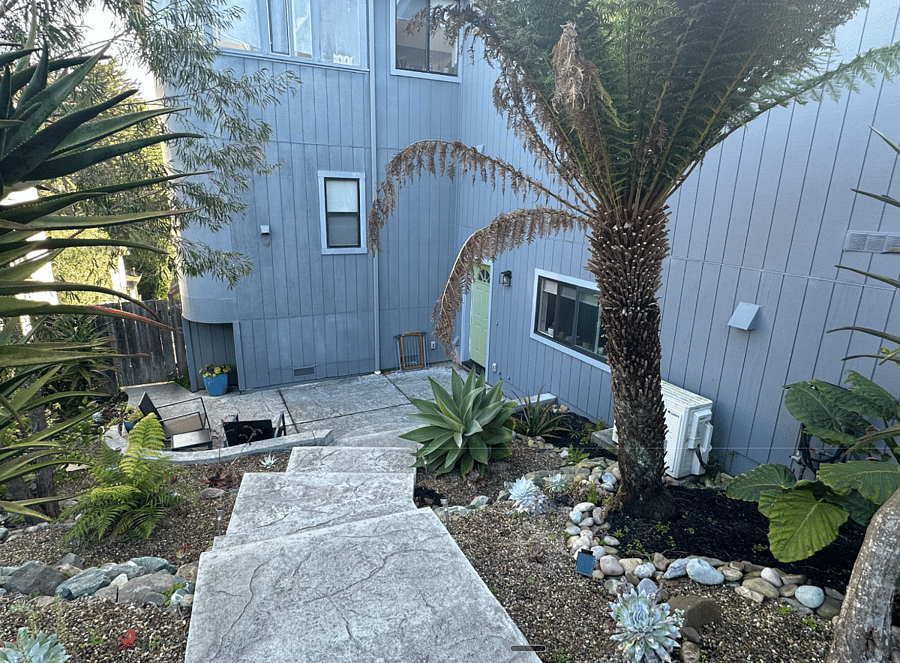 Stairs down to private entrance from parking spot