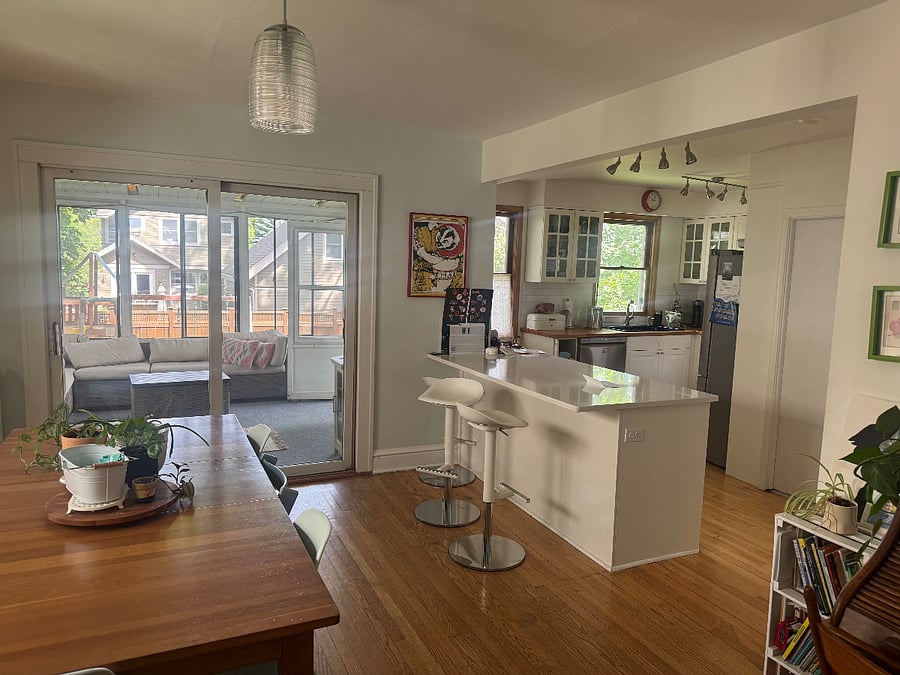 Dining room and breakfast bar; glimpse into the kitchen