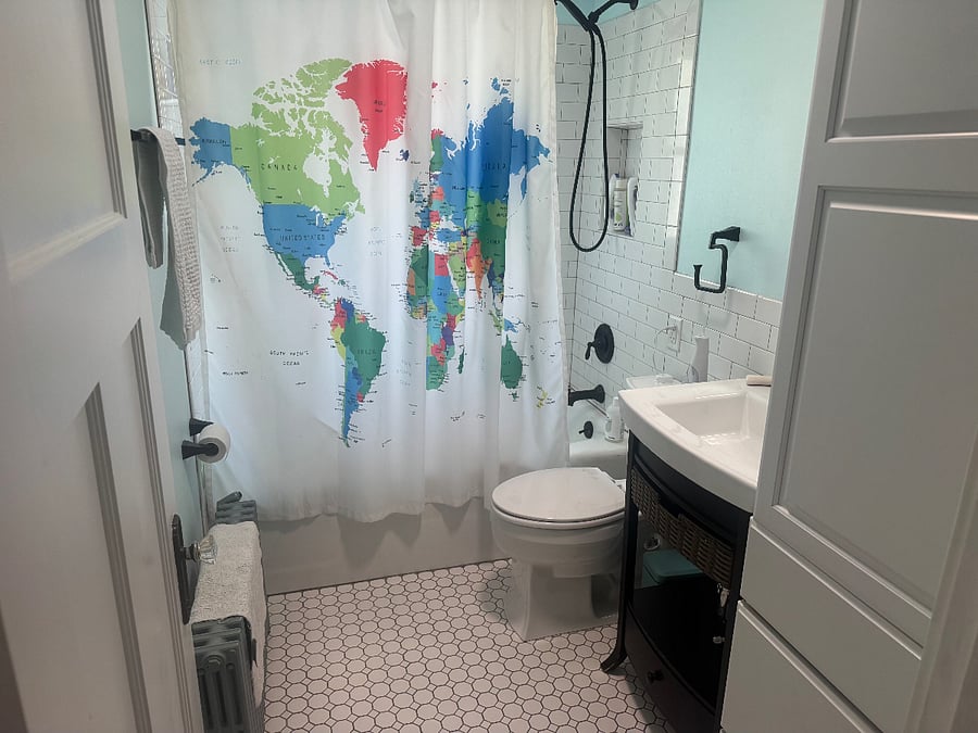 Full bathroom on second floor with bathtub and shower.