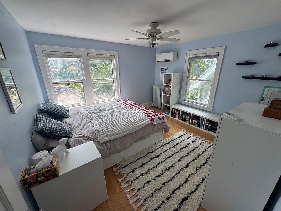 Second-floor bedroom with queen-sized bed.