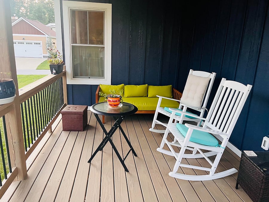 covered porch with outdoor seating