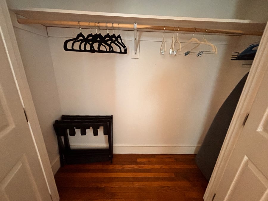 Both primary closets include cost hangers and two luggage racks.