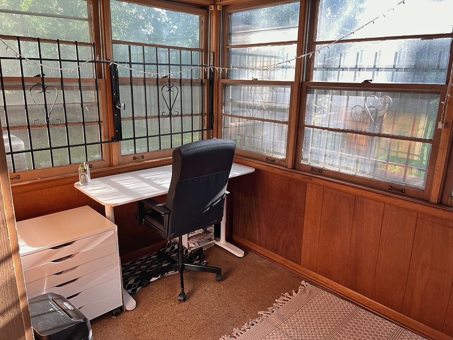 Sunroom office and library.