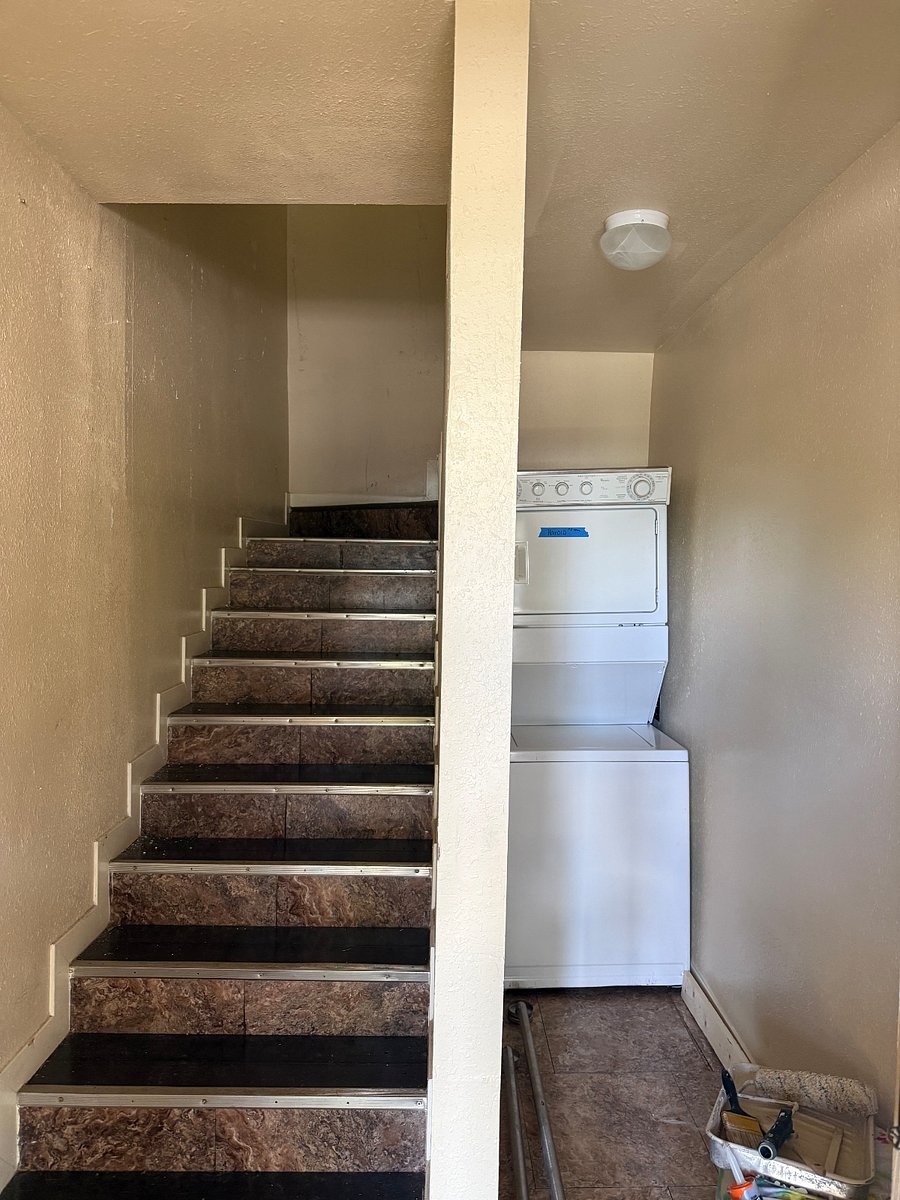 In unit washer and dryer for private use. Internal stairs to the upstairs unit.