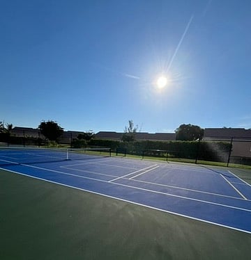 Newly resurfaced court functions as both pickle ball or tennis.