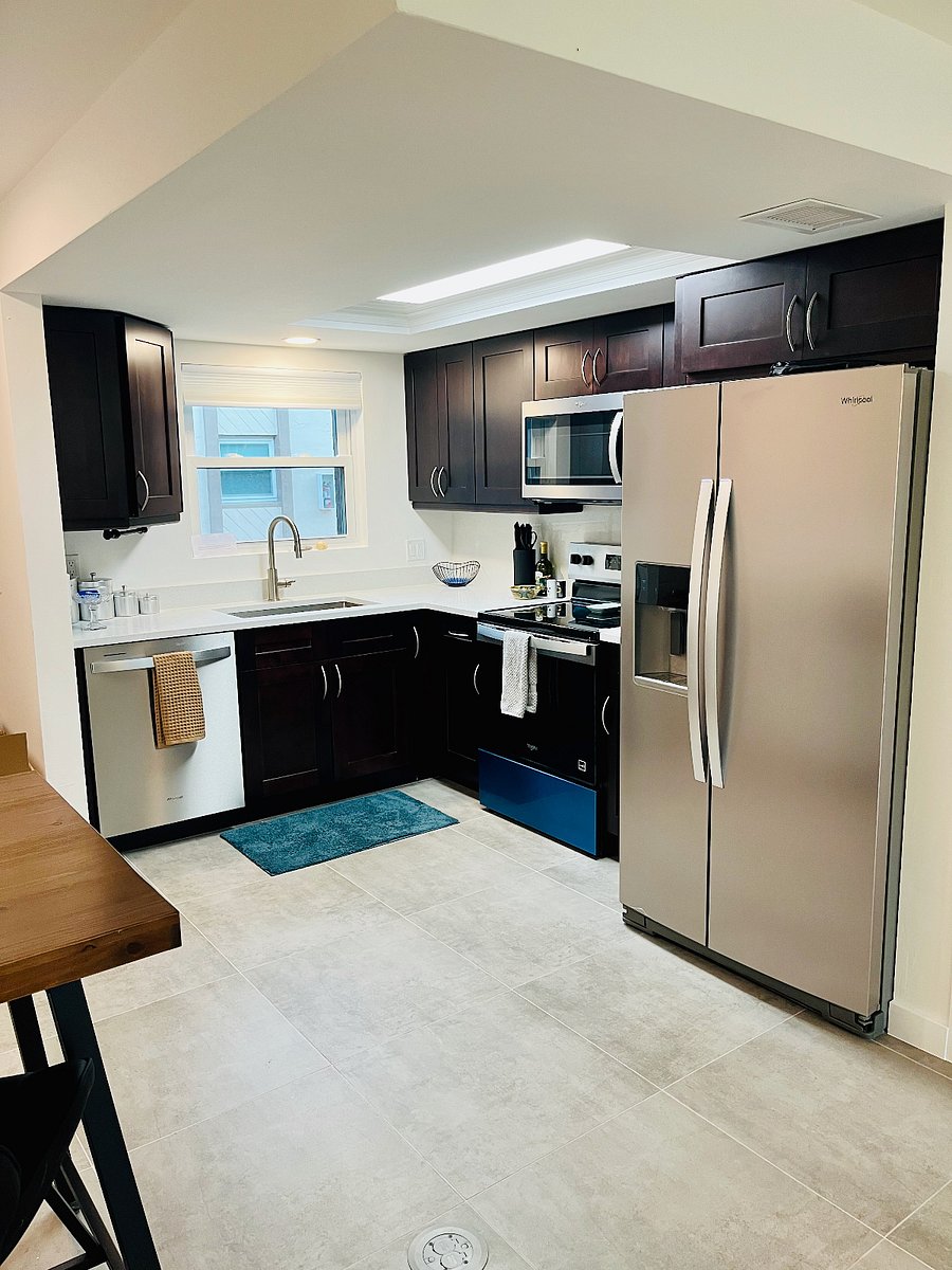 This well-stocked kitchen has a hot water pot, coffee maker, blender, emulsifier, utensils, multiple plating options for every occasion and holiday ware.