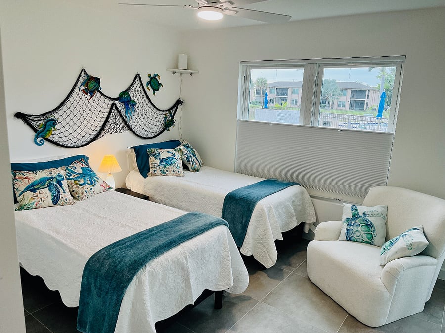 Flexible Twin XL beds with premium Awara organic mattresses can be configured as two separate beds or one King-size sleeping arrangement.  Window blinds are room darkening and open from top to bottom and bottom to top for every view.  Patio opens to the lanai.  