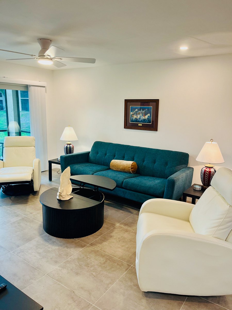 Living room with area for work, games, or dining.