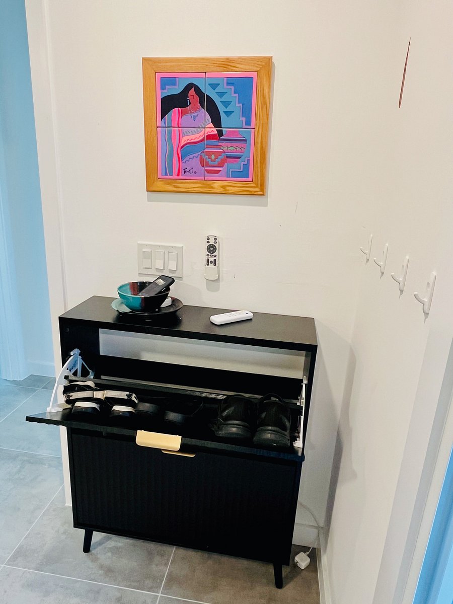 Hidden shoe rack for clutter free exploration.