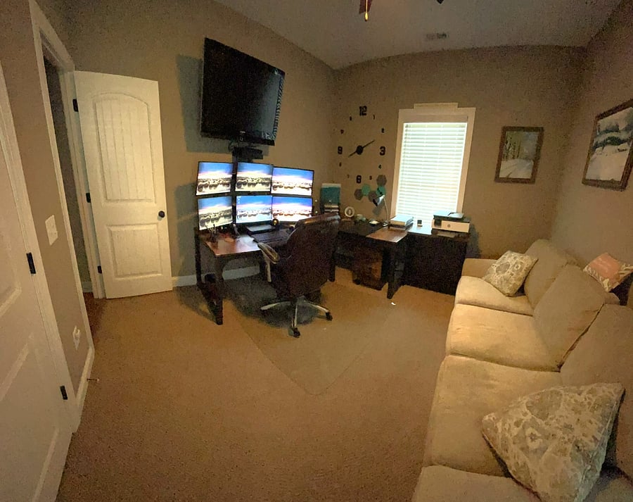 PRIVATE EXECUTIVE WORKSPACE: Space meets performance. Work seamlessly with dual universal docking stations and six 24-inch screens, then unwind on the plush sofa. Perfect for remote tech workers or consultants needing a high-powered home office.