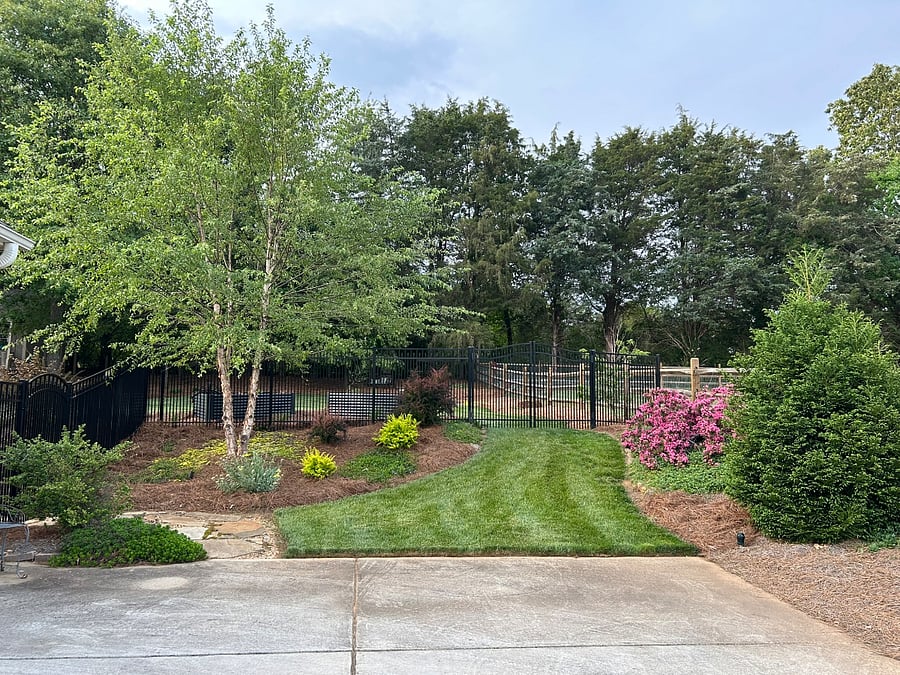 SECURE DRIVEWAY PARKING: Your designated off-street parking area monitored 24/7 by exterior security cameras. This spot sits right next to the electronic keypad garage door, providing safe, keyless entry into the home.