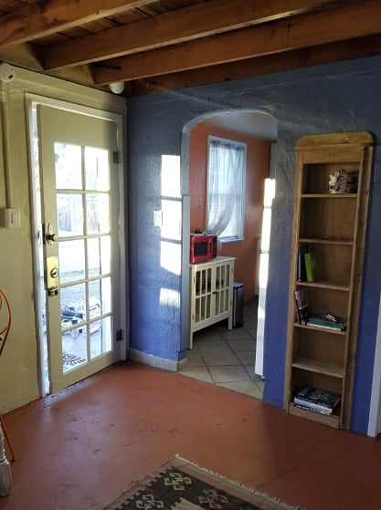 room facing the kitchen entry and outdoors