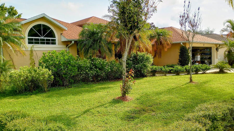 View of the front of the house as seen from the sidewalk.