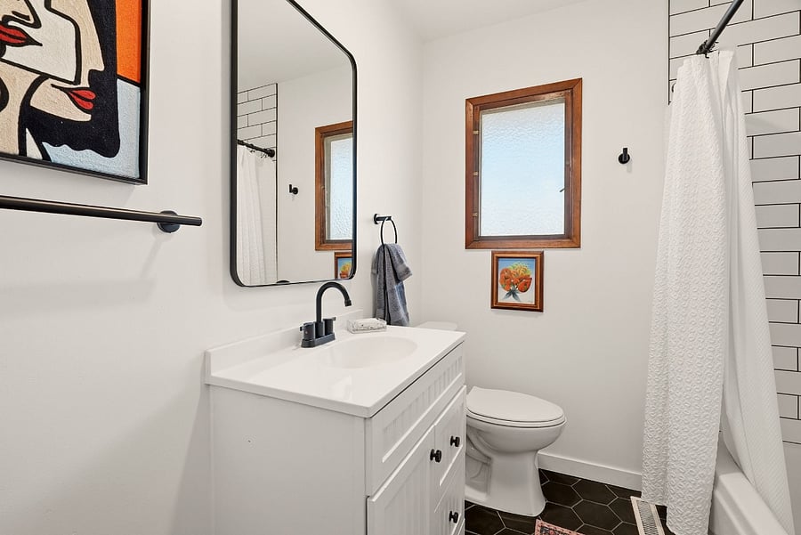 Upstairs bathroom with tub