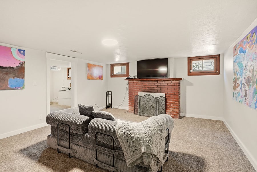 Bonus room with tv and fireplace