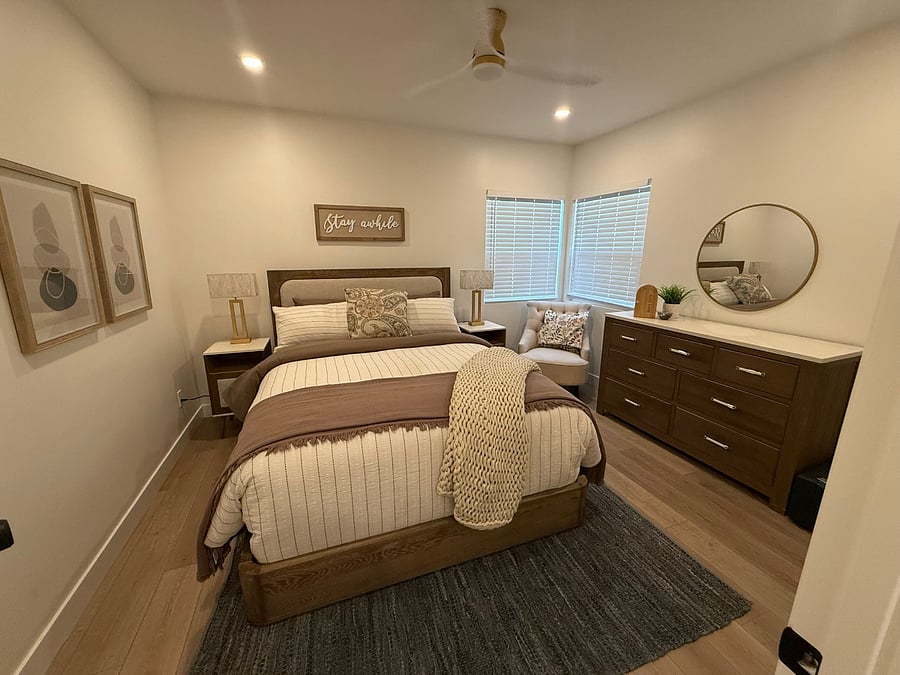RH Queen Bed with adjustable base, quality linens, comfortable chair and ample closet