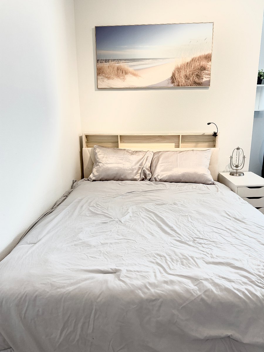 Queen Sized Bed, Satin Sheets, new pillows