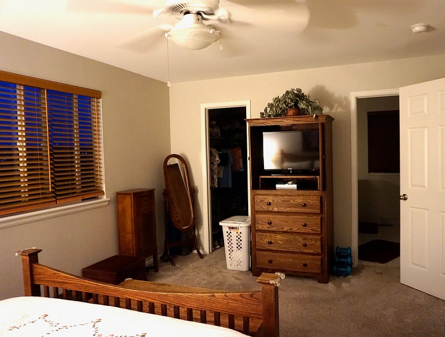 Master Bedroom showing TV, entries to master bath and walk-in closet