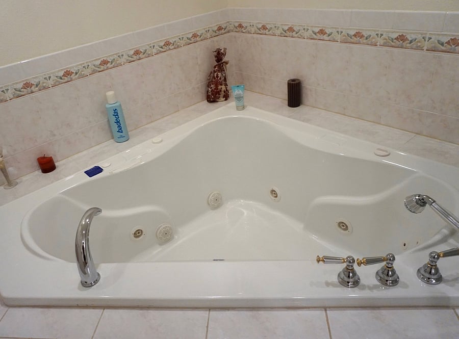 Jetted tub in basement bathroom