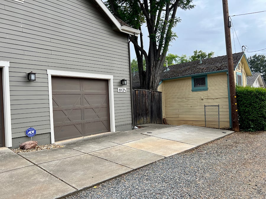 Dedicated, uncovered parking spot (no access to garage)