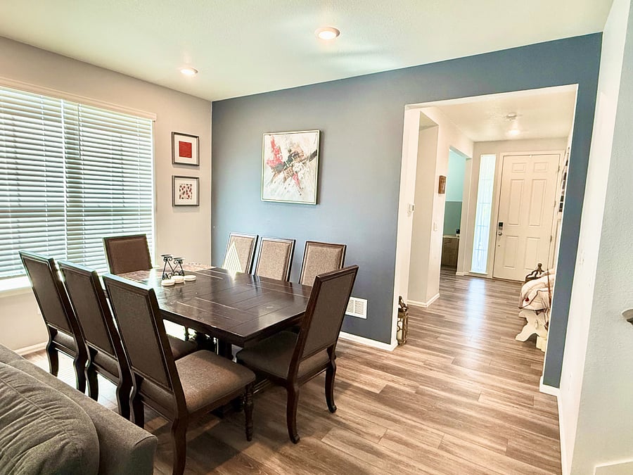 Dining Room: 8-person table, open concept.