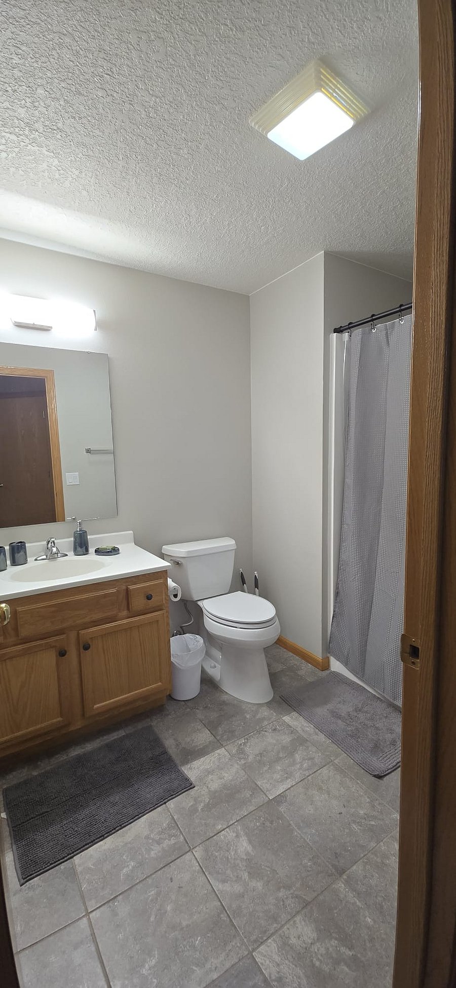 Bathroom with shower and starter toiletries