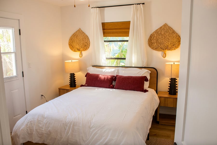 Queen bed in bedroom #2 which also has a TV wall-mounted
