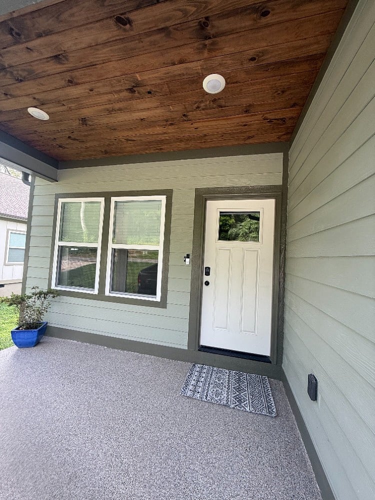 Front door / covered entrance (private parking for two vehicles at this entrance)