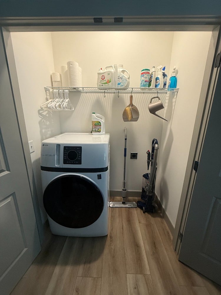 Laundry closet with brand new full size washer-dryer combo. Your clothes go through the wash and on to drying automatically. A signal lets you know when the load is dry. Cleaning supplies and vacuum provided. 