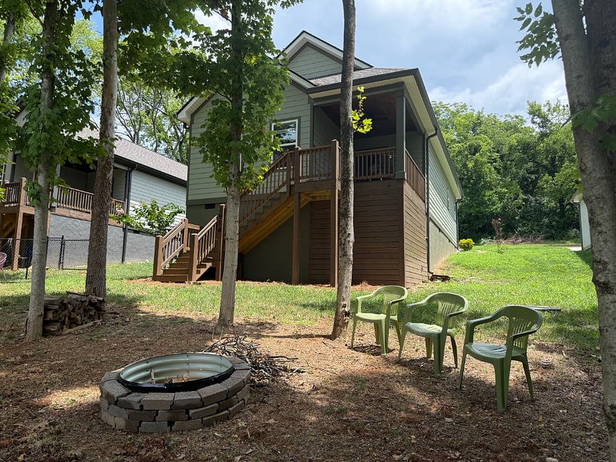 Back yard and fire pit. Locked storage for bikes is under the deck. 
