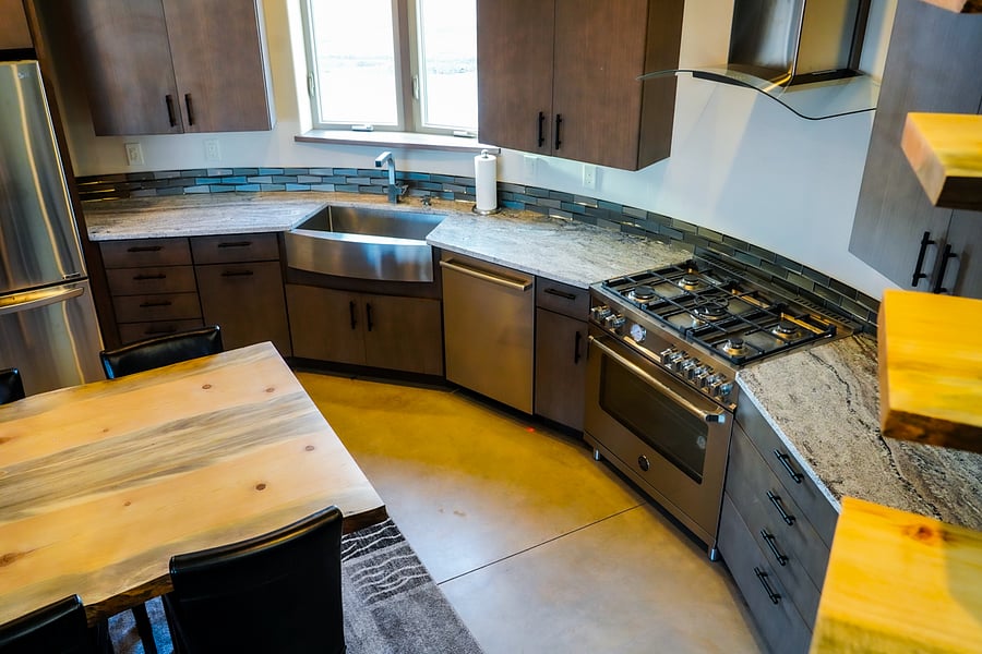 Kitchen in the round with all top end appliances. 