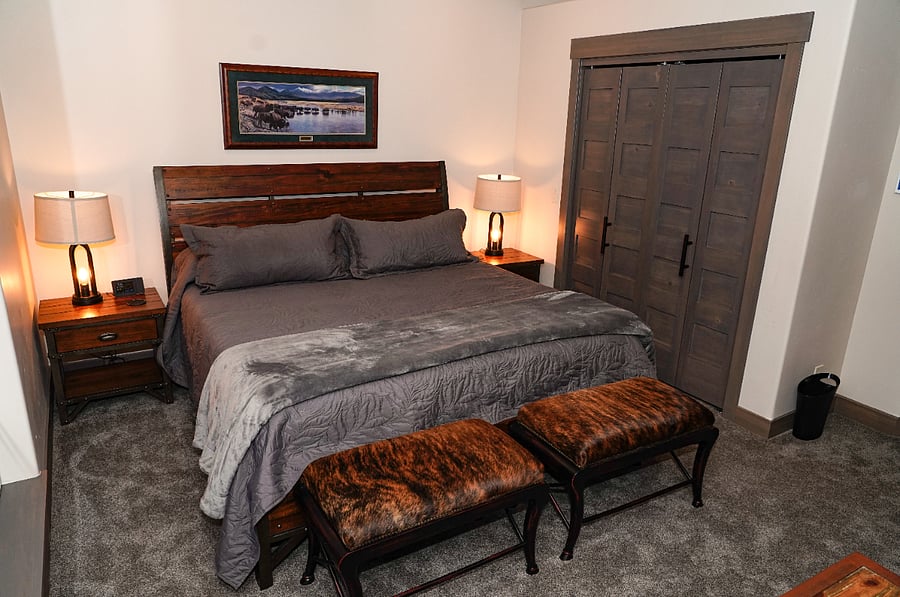 King size bed in guest suite.