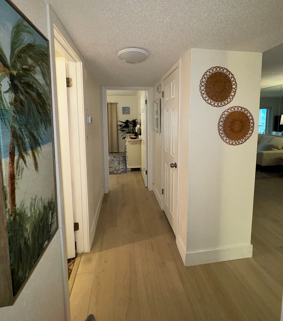 Hallway to bedrooms and bath