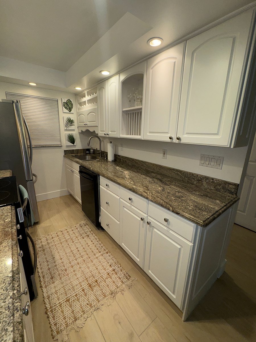 Cook with ease in the fully equipped kitchen, complete with new cookware, dishes, glassware, and convenient small appliances - perfect for everything from morning coffee to family dinners.