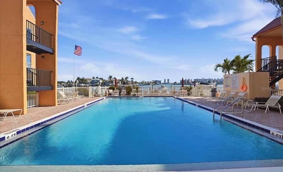 Heated waterfront pool overlooking the Intracoastal Waterway- perfect for relaxing, swimming, or enjoying the Florida sunshine year-round.