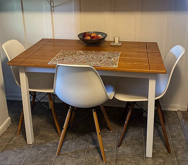 Dining table and three chairs