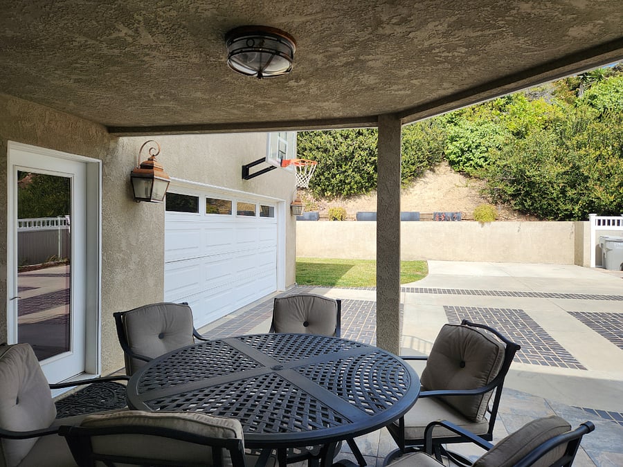 back patio, 2 outdoor off-street parking spaces, and back entrance. And basketball hoop!