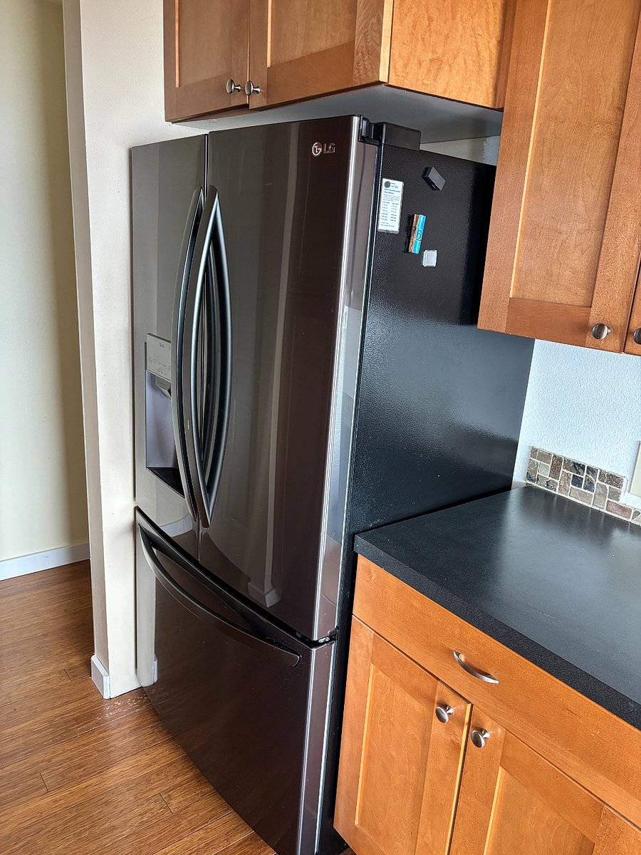 French door refrigerator with ice and filtered water. 