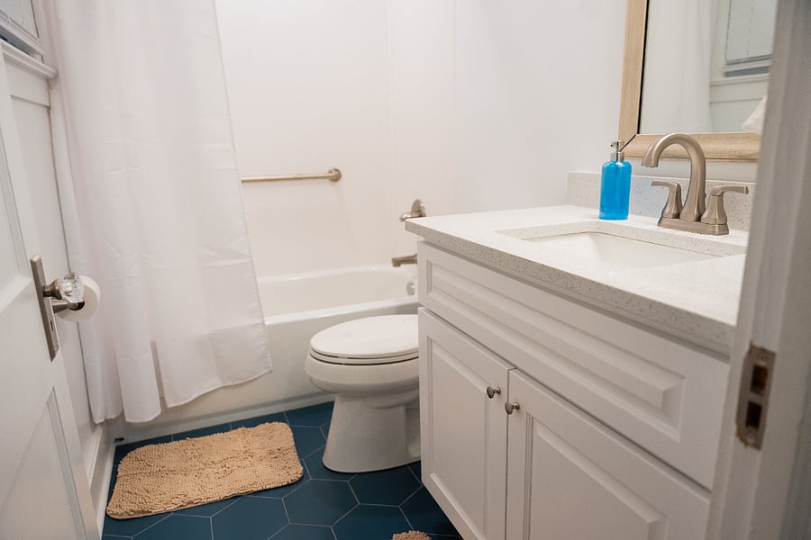 Combination Shower and Tub with Grab Bar