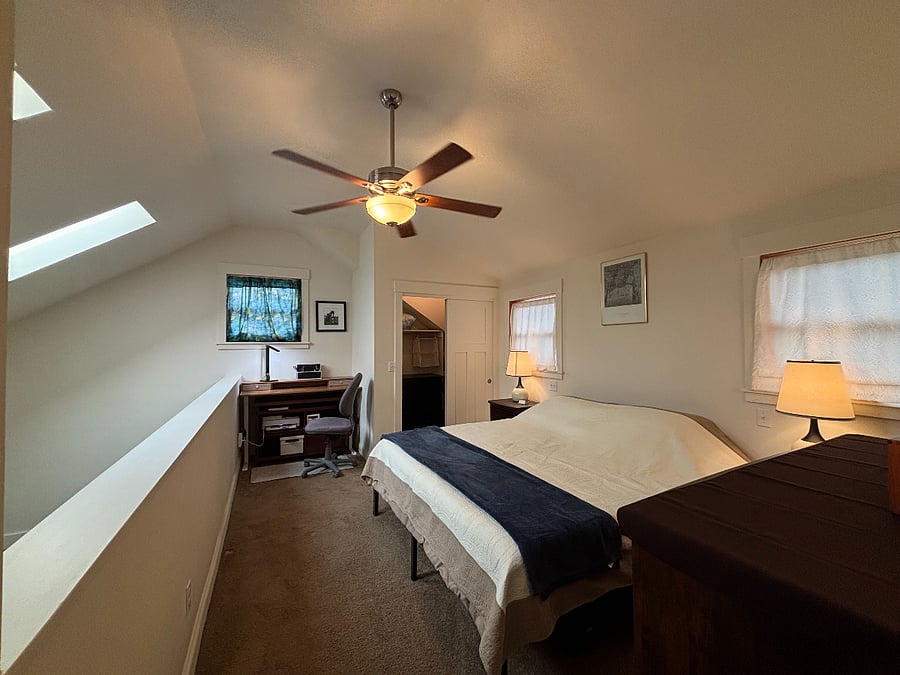 Lofted Bedroom. King. Two closets and dressers.