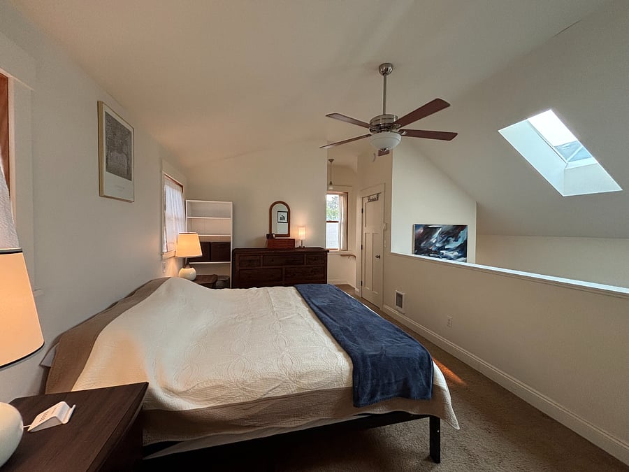Lofted Bedroom. King. Two closets and dressers.